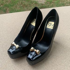 Dolce Vita gold bow 5” heel with 1” platform.